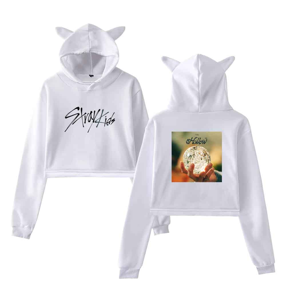 Stylish white hoodie with playful cat ears, featuring "Stray Kids" logo and an artistic moon phase graphic on the back, perfect for K-pop fans.