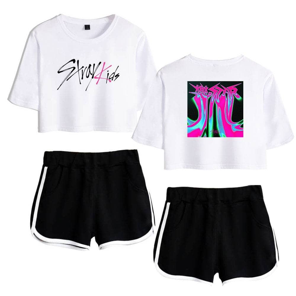 Striped black and white athletic shorts paired with cropped graphic T-shirts featuring bold, colorful designs, perfect for K-pop fan outfits and merchandise collections.